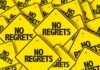American Idol Has NO REGRETS After Horrifying Crash A collection of yellow signs displaying the phrase 'No Regrets'