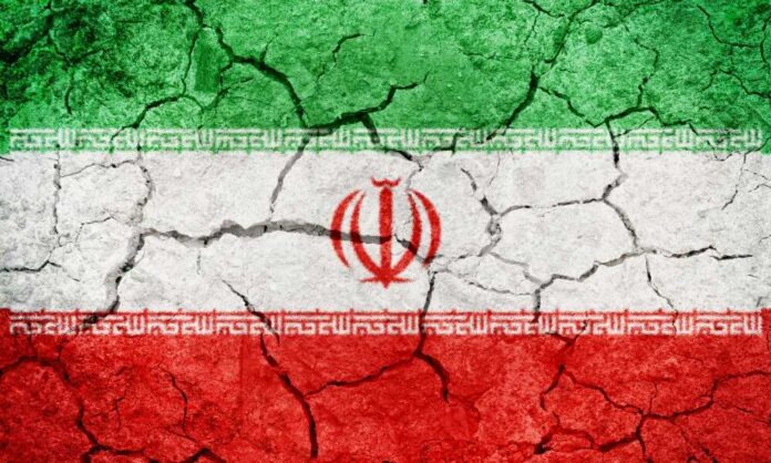 Cracked texture of the Iranian flag with green, white, and red colors