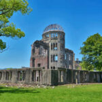 The Hiroshima Peace Memorial, a historic ruin surrounded by greenery