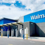 Walmart store entrance with blue skies above