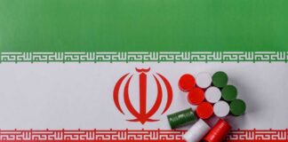 Colorful caps arranged on the Iranian flag