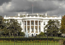 VIDEO: Classified White House Project EXPOSED! The White House with dark clouds overhead.