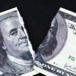 Shock Prediction: Bond Market Set to Crack A torn hundred dollar bill featuring Benjamin Franklin