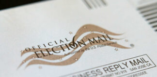 Official election mail envelope with postal service markings