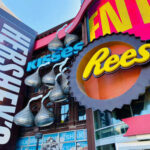 Reese’s Grandson’s Bold Move Forces Hershey’s Hand Colorful storefront featuring Hershey's and Reese's signage