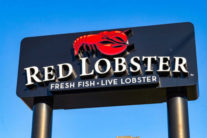 Red Lobster restaurant sign with red lobster logo.