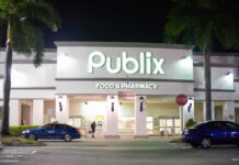 Exterior view of a Publix grocery store at night