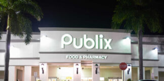 Exterior view of a Publix grocery store at night