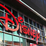BOX OFFICE SHOCK: Lowest Disney-Era Launch! Disney sign on building with Mickey Mouse figure