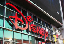 BOX OFFICE SHOCK: Lowest Disney-Era Launch! Disney sign on building with Mickey Mouse figure