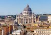 St. Peter's Basilica in Rome with a clear blue sky