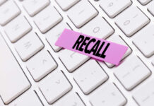 Metal in Ice Cream! Recall Shocks 17 States A pink sticky note with the word 'RECALL' placed on a white keyboard