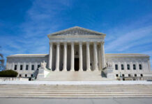 Supreme Court Stuns Libs — Map Scrapped! U.S. Supreme Court building under clear blue sky.