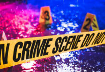 VIDEO: Youth Center Carnage – 6 Dead Crime scene tape with blurred evidence markers.