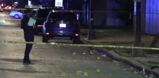 Drive-by shooters fire into crowd, injuring at least 13 people on South Side, Chicago police say