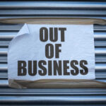 175 Popular Stores Closed – Now What? Out of Business sign on closed store shutters.