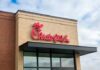 Chick-fil-A Goes Invisible?? Chick-fil-A restaurant sign on a brick building