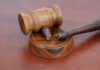 Trump’s Billion-Dollar Slush Fund? Judge Slams Brakes A wooden gavel resting on a circular base