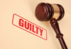 War Hawk Toppled: Bolton Admits Felony Guilty stamp with gavel