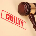 War Hawk Toppled: Bolton Admits Felony Guilty stamp with gavel