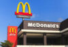 McDonald’s Pie Comeback Sparks Frenzy McDonalds drive-thru sign against a blue sky.