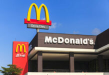 McDonald’s Pie Comeback Sparks Frenzy McDonalds drive-thru sign against a blue sky.