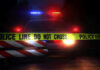 6 Gunned Down As Soft-On-Crime Failure Explodes Police car with flashing lights behind caution tape.