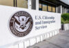 Visa Racket Exposed? Trump Team Takes Action U.S. Citizenship and Immigration Services building sign.