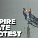Love Stunt Triggers NYPD Lockdown Protesters scale Empire State Building
