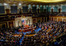 Stock Ban Tease — Did Congress Blink? Full chamber meeting with numerous attendees and speakers.
