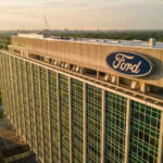 Family Seat May Lurch — Ford Knew? Ford headquarters building aerial view.