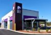 Diarrhea Parasite Targets Taco Bell? Exterior view of a Taco Bell restaurant with outdoor seating area