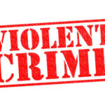 Bloody Weekend, Baffling Numbers As Dead Bodies Mount Red stamp with the words VIOLENT CRIME
