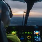 Russian Buzz Near Carrier Sparks Standoff Pilot's view from a helicopter cockpit during sunset