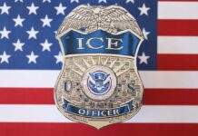ICE Moves First In Toddler Killing ICE officer badge displayed against an American flag background