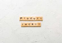 Label Fail Sparks Multi-State Cookie Recall Wooden letter tiles forming words on a white textured surface
