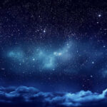 Cosmic Toddlers Hide Fully Grown Monsters Starry night sky with clouds below