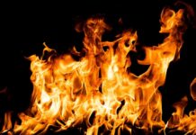Deadly Fireworks Blast, Manslaughter Arrest Bright orange flames against a black background
