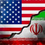 Trump Hits Back: Iran’s Boats Blown Apart A cracked wall displaying the flags of the USA and Iran, symbolizing conflict
