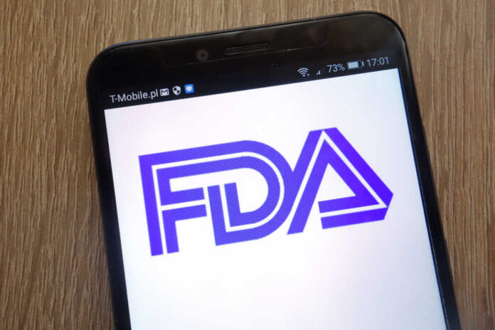 Konskie,,Poland,-,September,01,,2018:,Food,And,Drug,Administration Close-up of a smartphone displaying the FDA logo