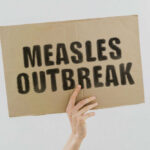 Deadly Measles Comeback Shocks Community Measles outbreak sign