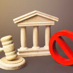 Epic Smackdown: Maxwell Bid Crushed Wooden courthouse with a gavel and red prohibition symbol