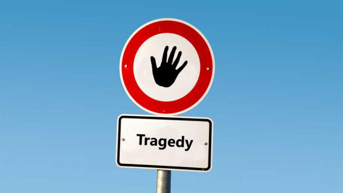 Street,Sign,The,Direction,Way,To,Comedy,Versus,Tragedy Road sign with hand stop symbol and a lower sign reading Tragedy