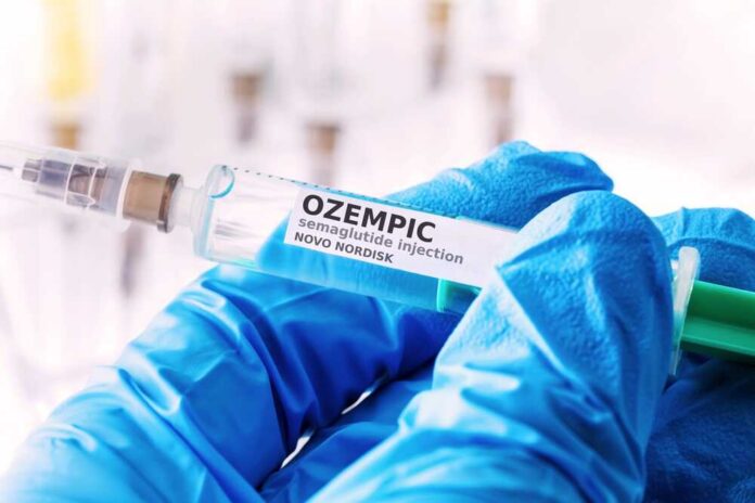 Siegen,,North,Rhine,Westphalia,,,Germany,-,10,11,2023: Gloved hands holding a syringe labeled Ozempic