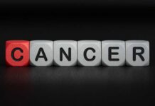 Rare Cancer Steals Rising Influencer Blocks spelling the word 'CANCER' with one block in red
