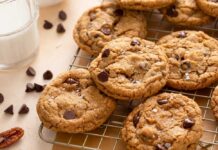 Chocolate Chip Whiplash: Costco Flips Again?! Chocolate chip cookies cooling on a wire rack beside a glass of milk
