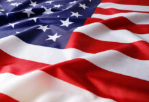 American flag with stars and stripes in close-up