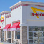 Six-Figure Burger Bosses? In-N-Out Burger restaurant exterior with red awnings