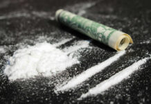 CRIME: Monster Cocaine Haul Stuns Cops Cocaine lines with rolled banknote on surface