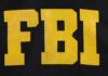 FBI Freezes Terrorist Crypto — Huge Details FBI logo displayed in large yellow letters on a black background
